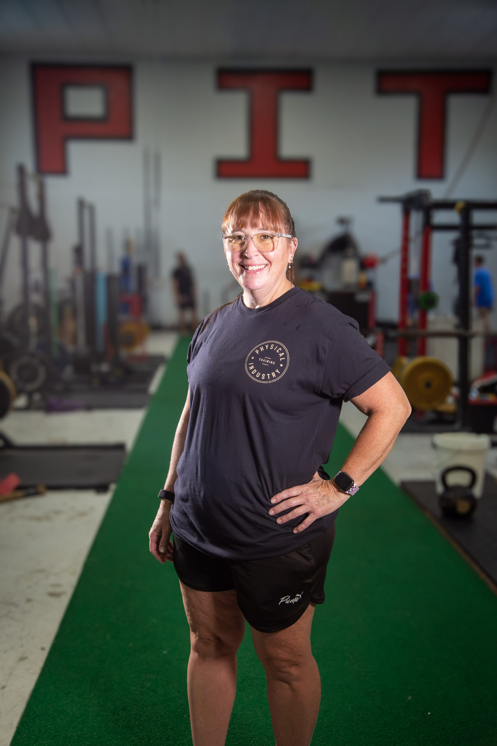 Coach Lori Konen portrait at Physical Industry Training